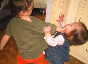 Kid Hitting Another Kid - Nexus Business Solutions - How to Have Healthy Conflict at Work Kid hitting another Kid - Healthy Conflict.jpg